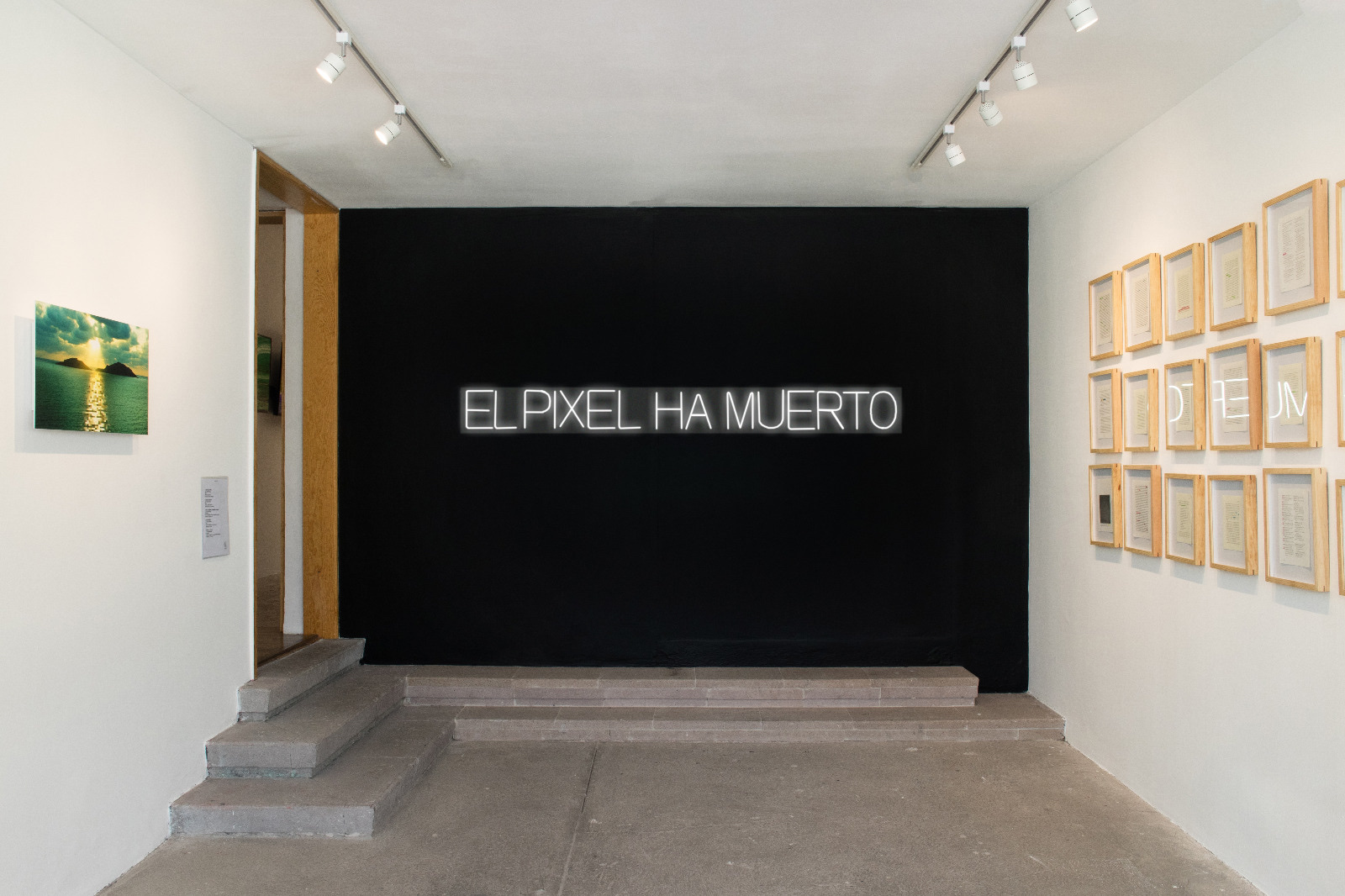 RGB + Dead Pixel — installation view, with the neon EL PIXEL HA MUERTO